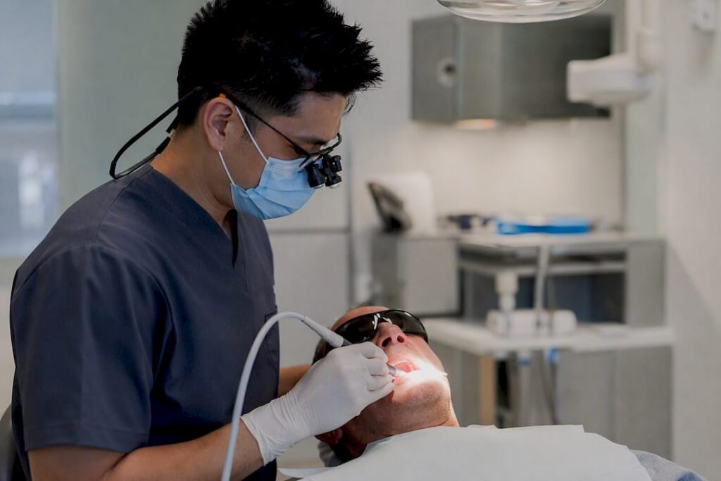Close-up of laser crown lengthening treatment