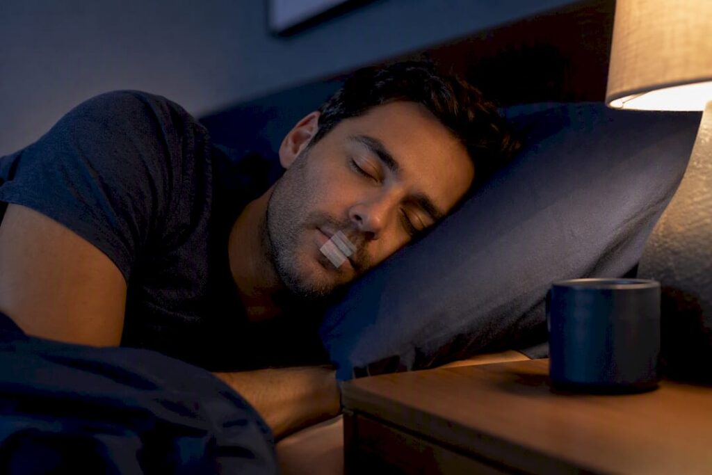 Sleeper shown with small mouth tape strip
