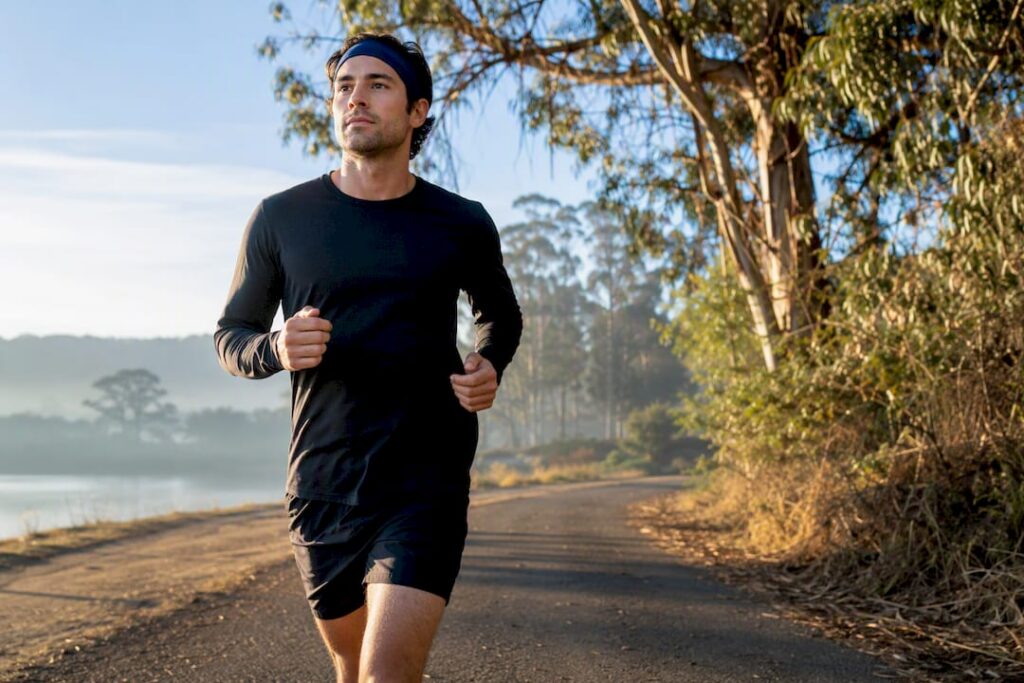 Runner practicing nasal breathing on trail